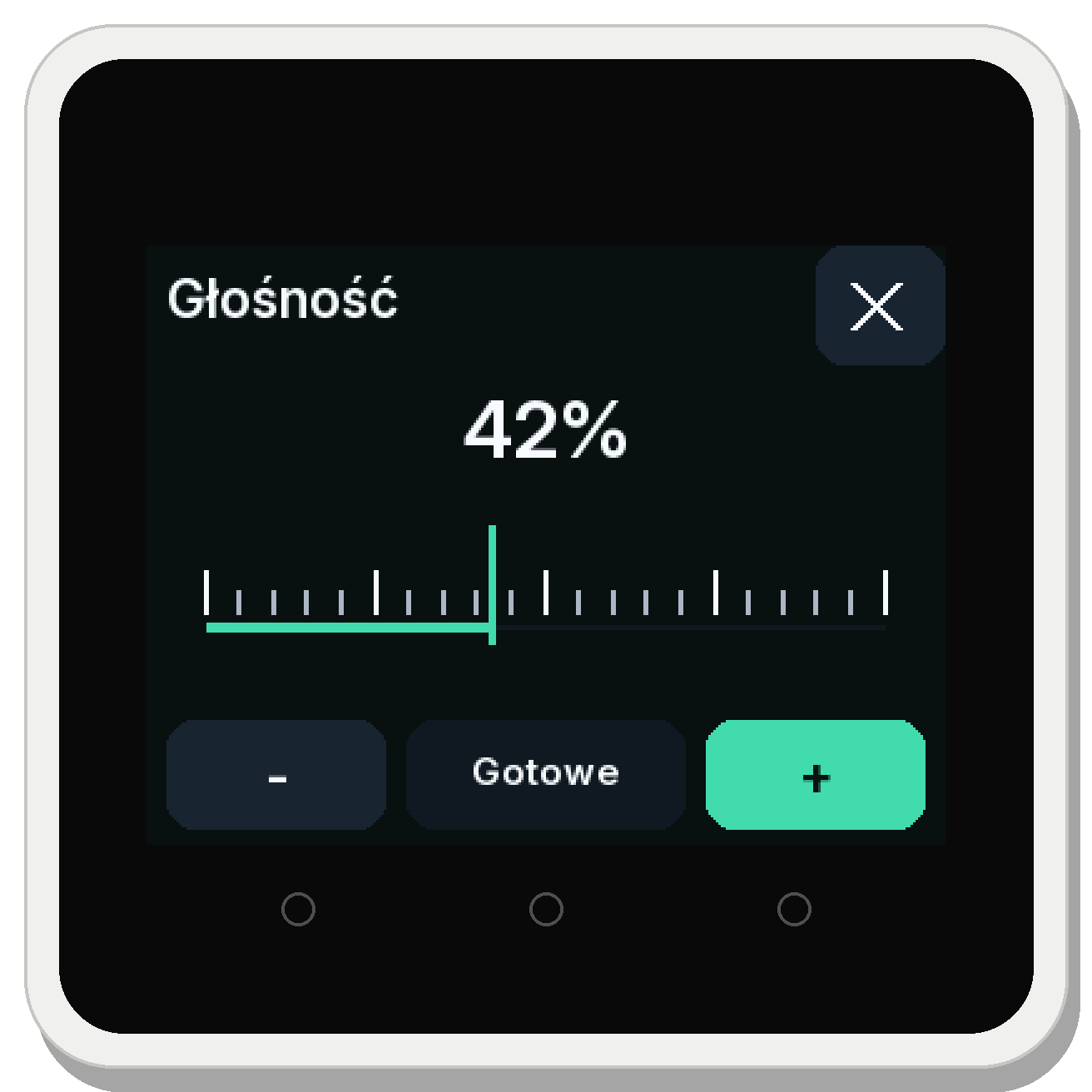 Kostka Open Radio od przodu: biały korpus, czarny ekran z napisem Głośność i wartością 42 procent, pod ekranem trzy pola dotykowe.